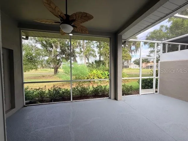 a view of a room with a large window