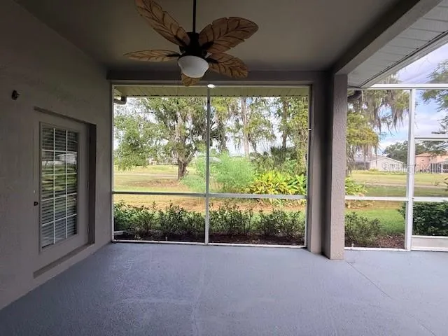 a view of a room with a large window