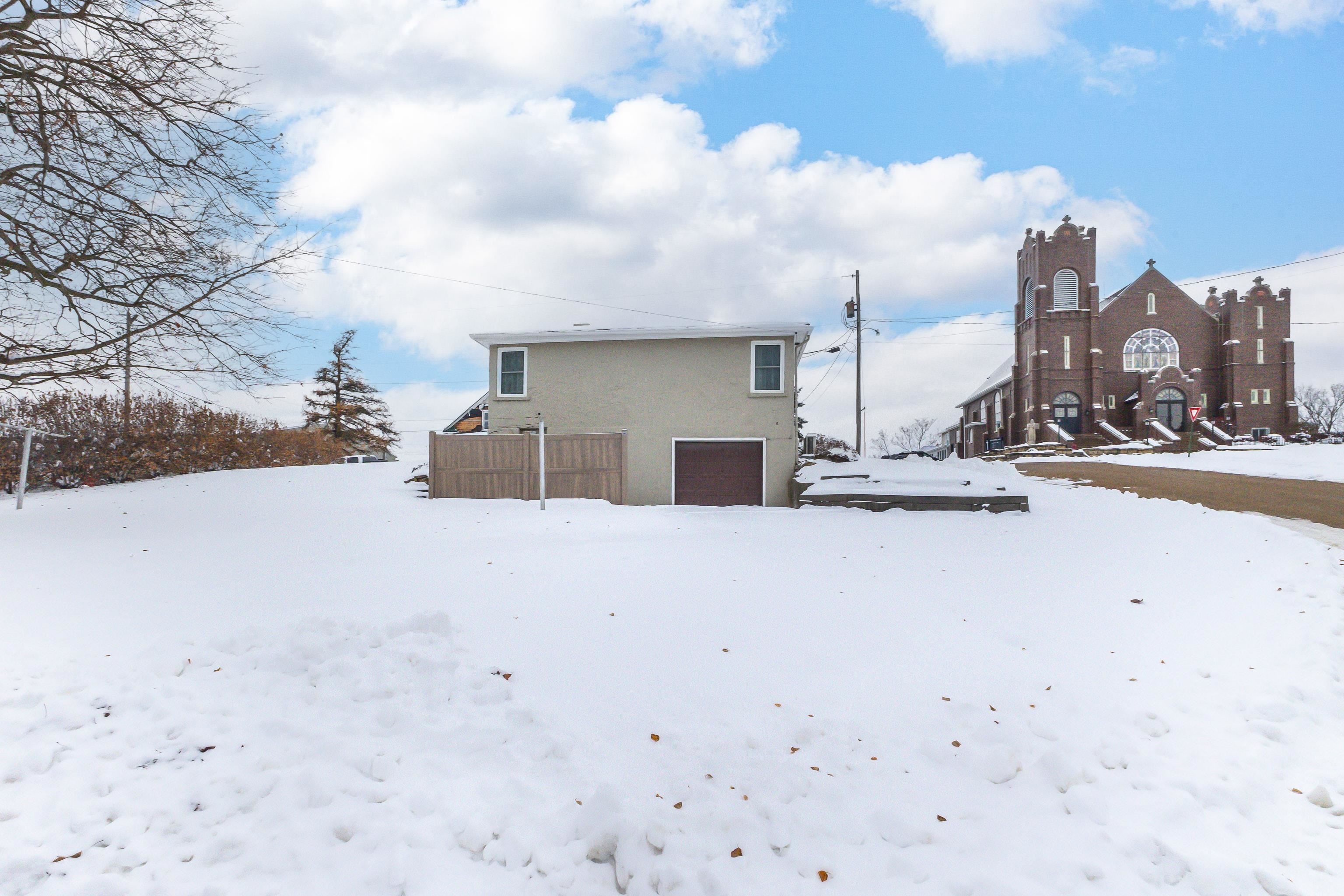 319 East Catlin Street Elizabeth, IL 61028 - Photo 25 of 26 a view of a road with a building in the background