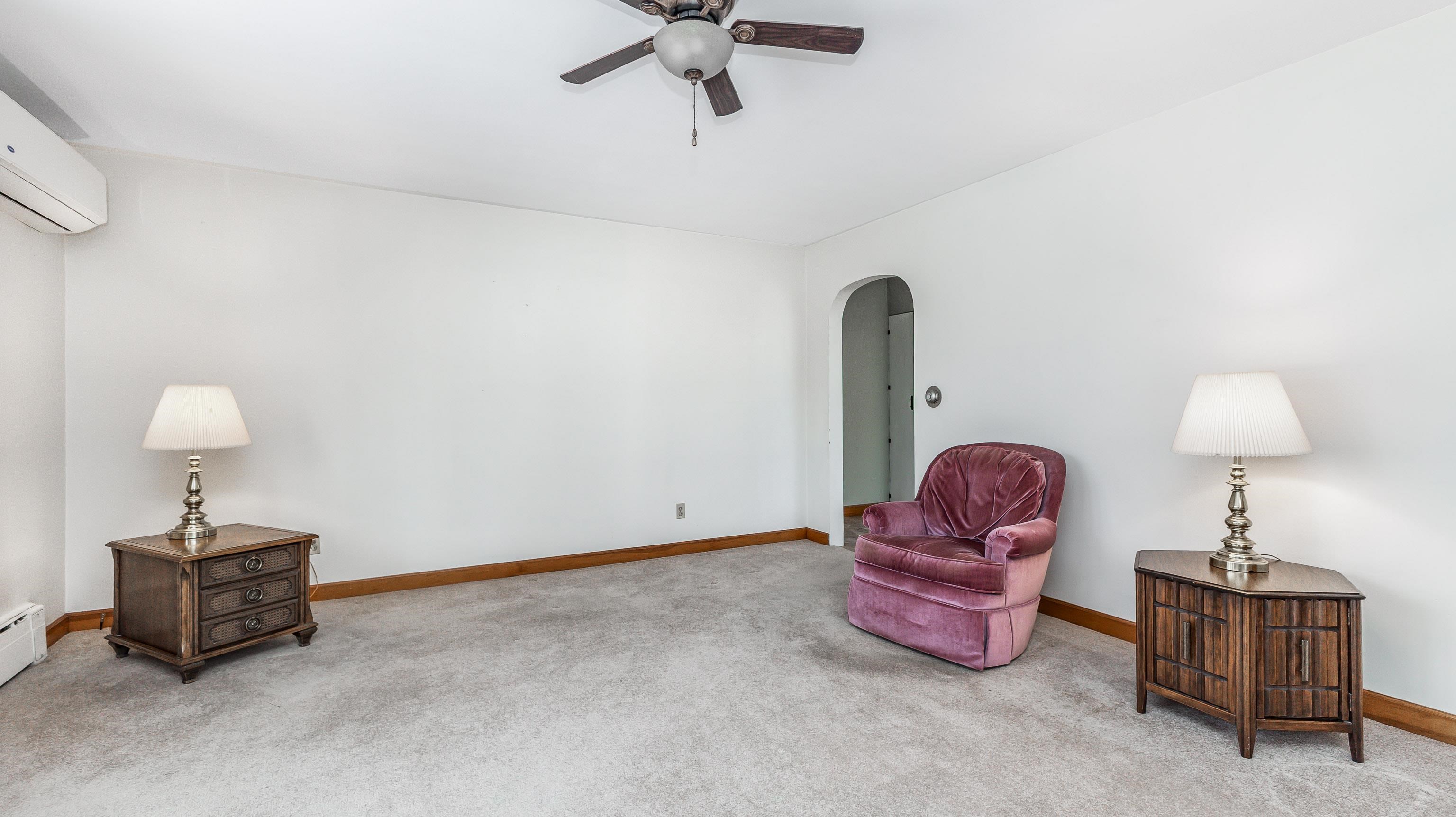 319 East Catlin Street Elizabeth, IL 61028 - Photo 5 of 26 a room with table chairs and a chandelier