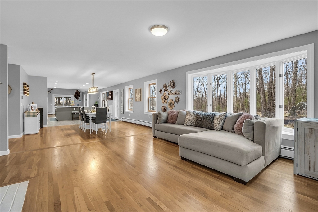 79 Tyler Road Townsend, MA 01469 - Photo 13 of 41 a living room with furniture and a wooden floor