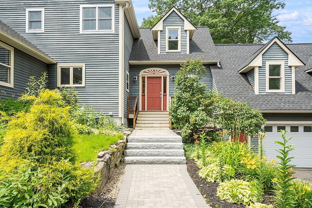 79 Tyler Road Townsend, MA 01469 - Photo 2 of 41 a front view of a house with a yard