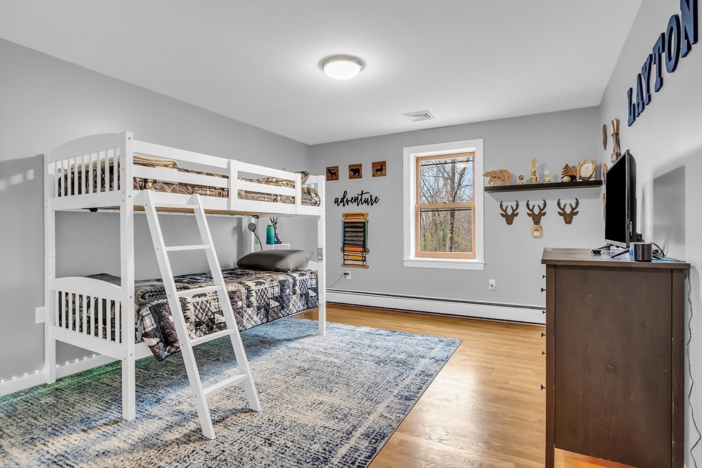 79 Tyler Road Townsend, MA 01469 - Photo 30 of 41 a living room with furniture and a window