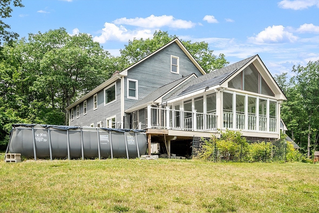 79 Tyler Road Townsend, MA 01469 - Photo 39 of 41 a front view of a house with a yard