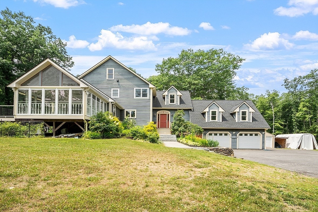 79 Tyler Road Townsend, MA 01469 - Photo 40 of 41 a front view of a house with a yard