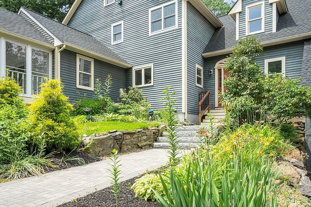 79 Tyler Road Townsend, MA 01469 - Photo 41 of 41 a view of a backyard with potted plants