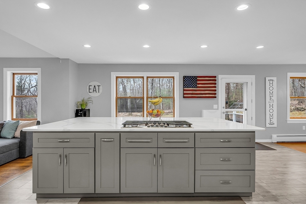 79 Tyler Road Townsend, MA 01469 - Photo 7 of 41 a kitchen with granite countertop cabinets and window