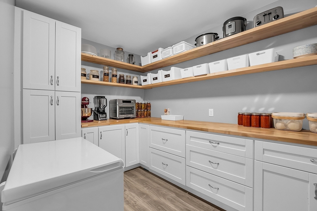 79 Tyler Road Townsend, MA 01469 - Photo 8 of 41 a kitchen with cabinets and window