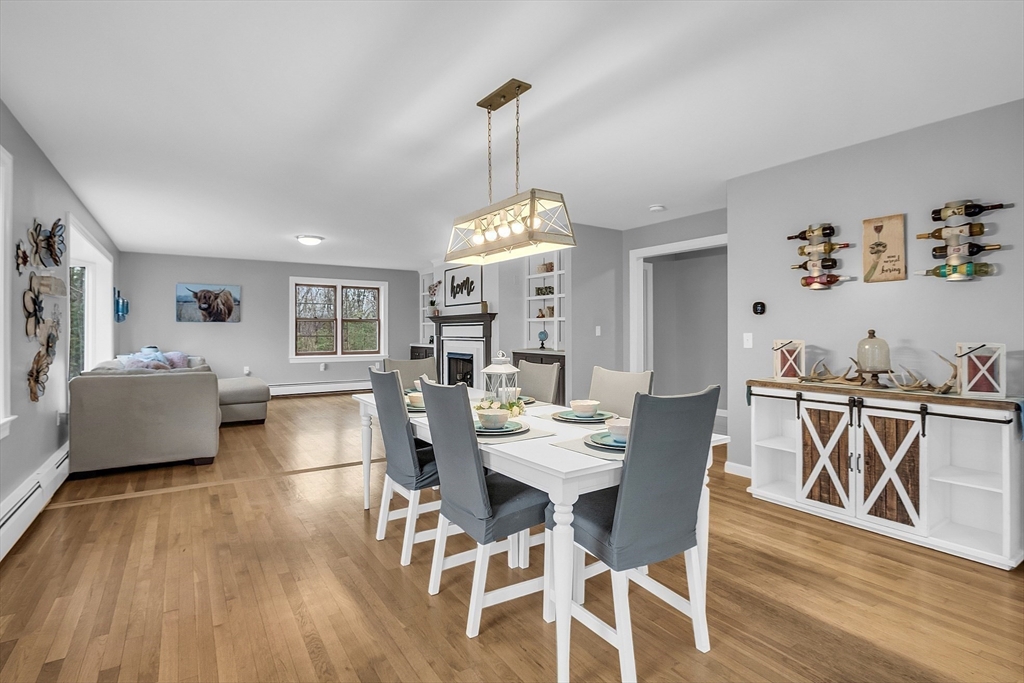 79 Tyler Road Townsend, MA 01469 - Photo 9 of 41 a view of a dining room with furniture window and wooden floor