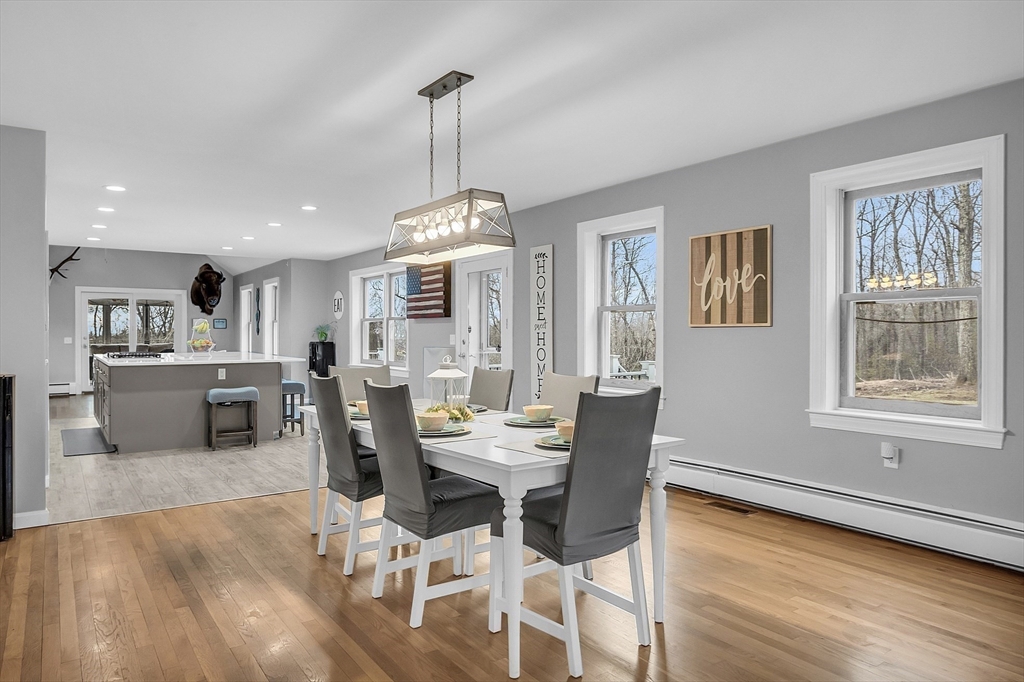 79 Tyler Road Townsend, MA 01469 - Photo 10 of 41 a view of a dining room with furniture window and wooden floor