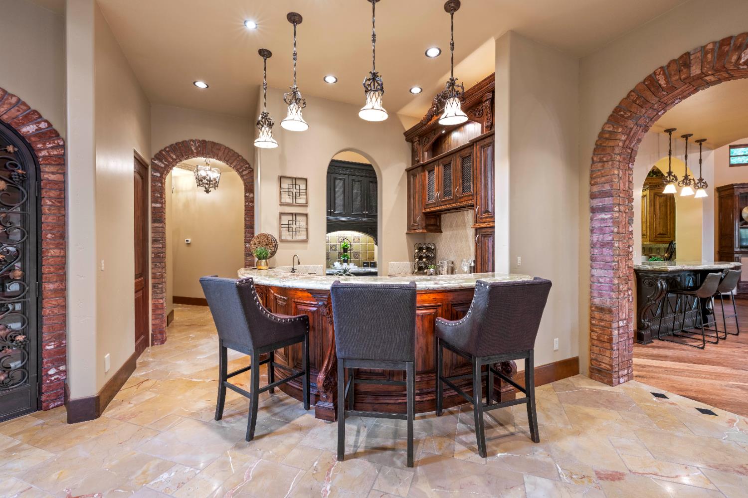 9345 King Road Loomis, CA 95650 - Photo 13 of 99 a dining room with furniture and a chandelier