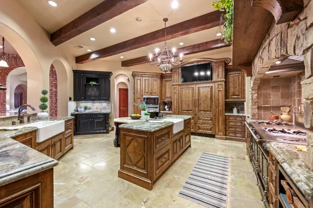 a room with furniture projector and screen