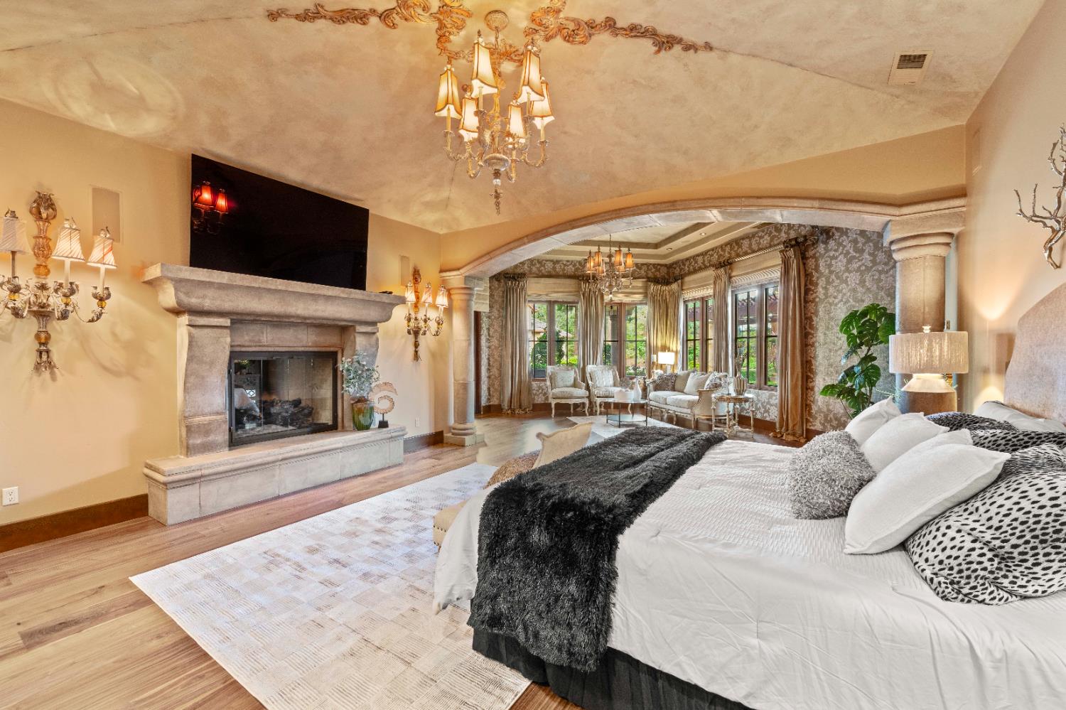 9345 King Road Loomis, CA 95650 - Photo 35 of 99 a spacious bedroom with a bed and a flat screen tv