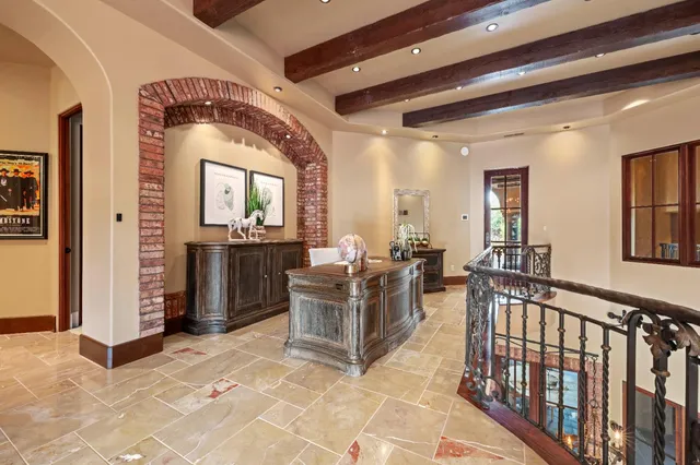 a view of a workspace with furniture