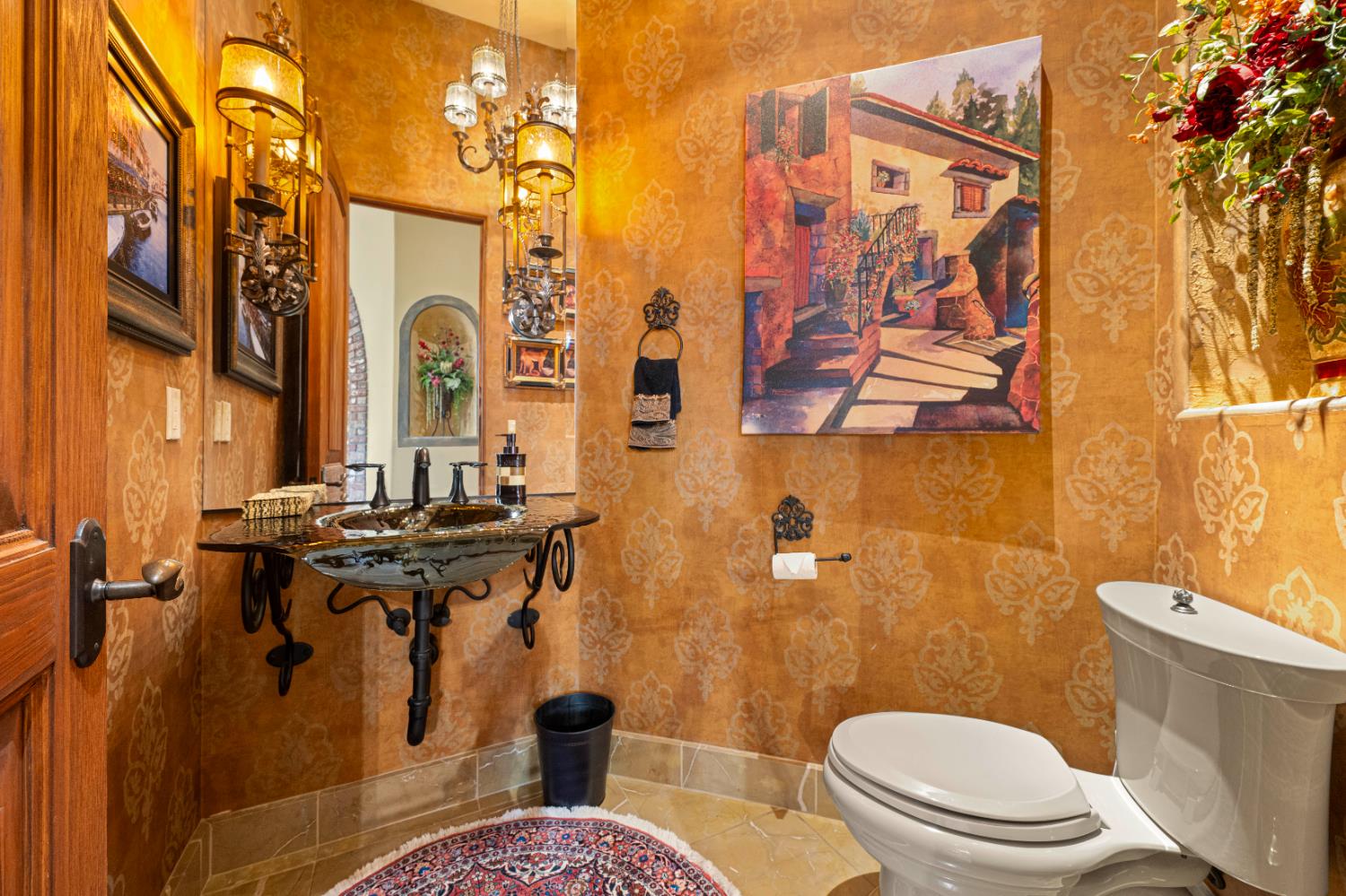 9345 King Road Loomis, CA 95650 - Photo 42 of 99 a bathroom with a sink a toilet and shower curtain