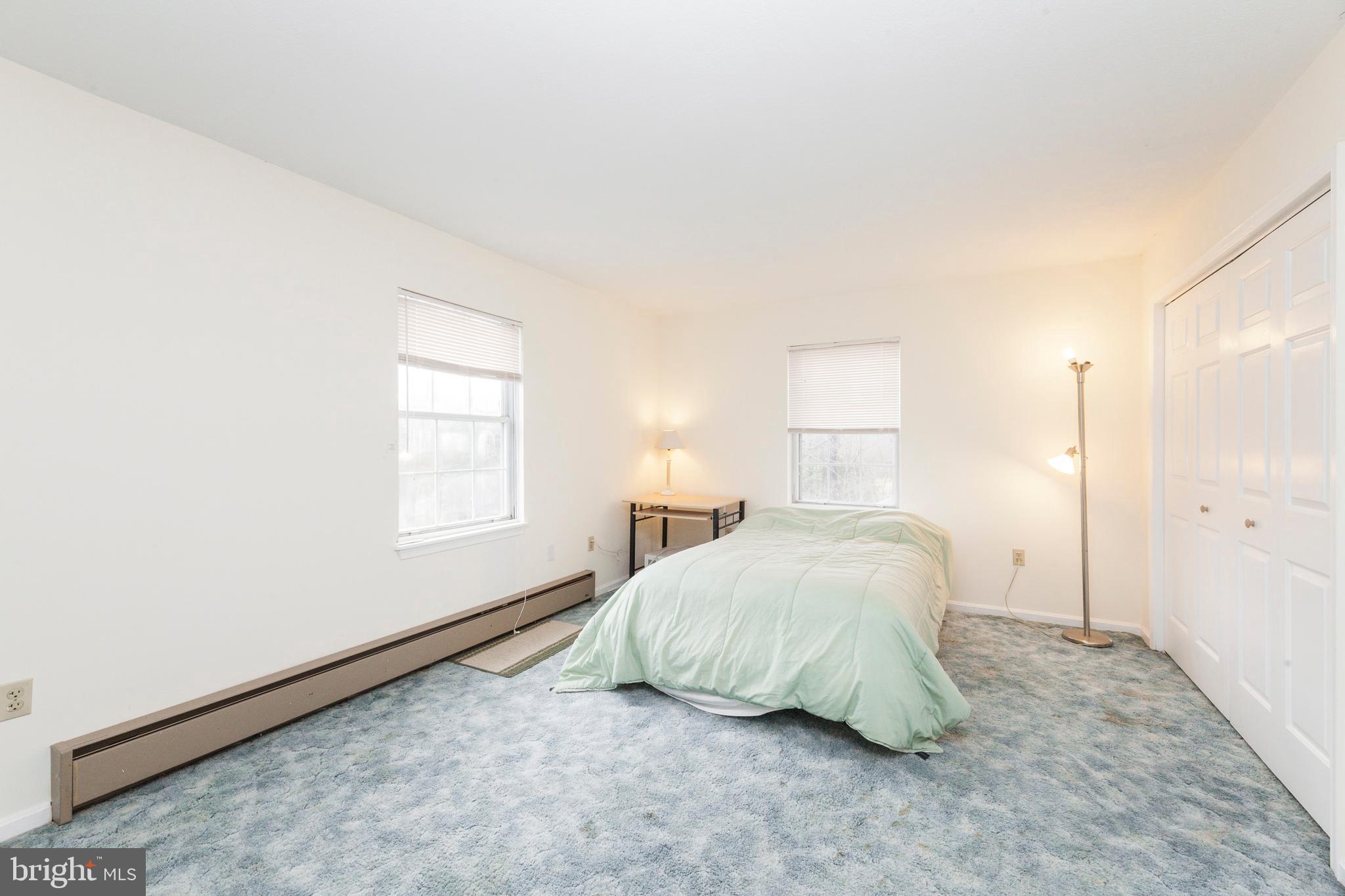 16000 Stone Foot Road Accokeek, MD 20607 - Photo 11 of 45 a bedroom with a bed and a window