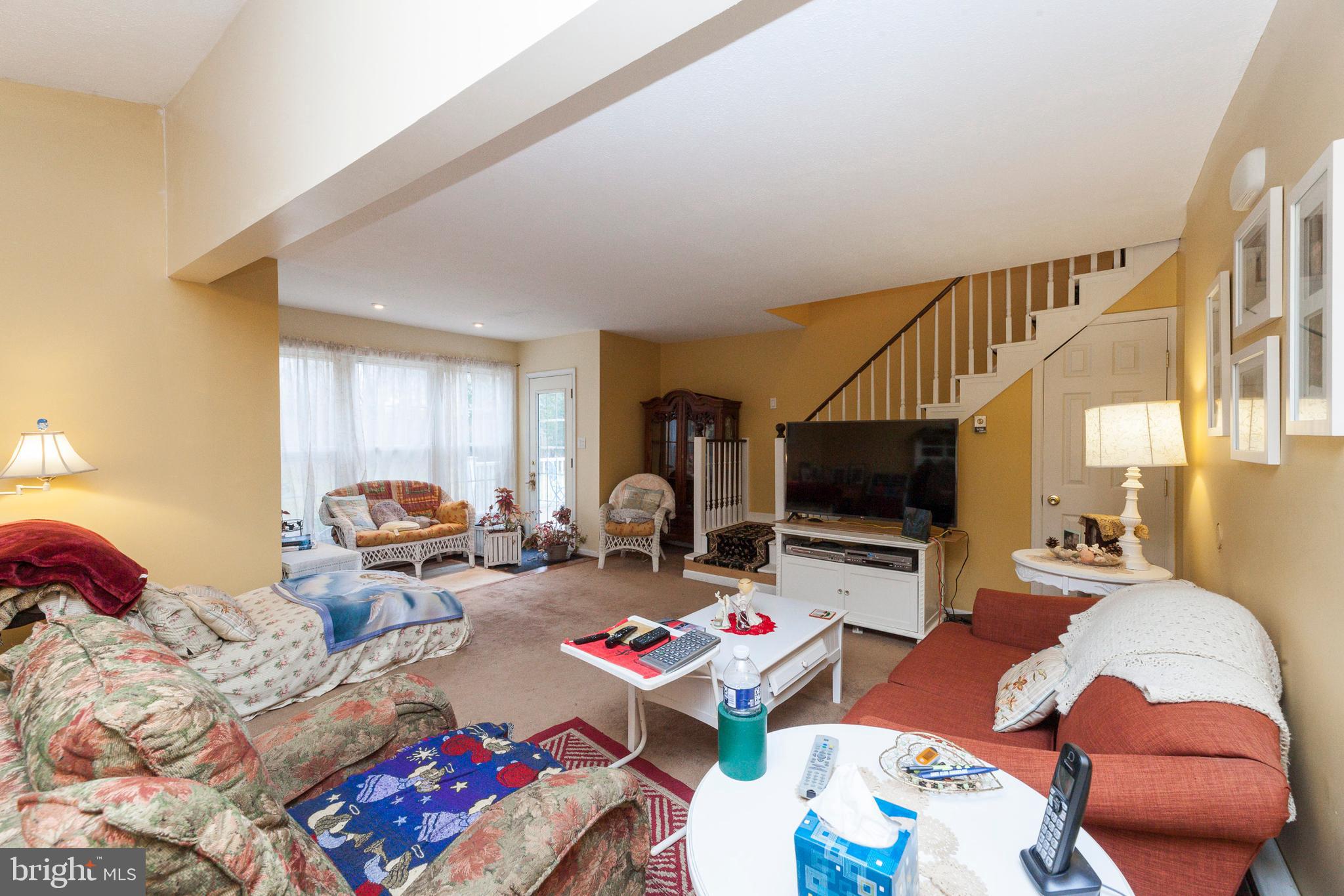 16000 Stone Foot Road Accokeek, MD 20607 - Photo 13 of 45 a living room with furniture and a flat screen tv