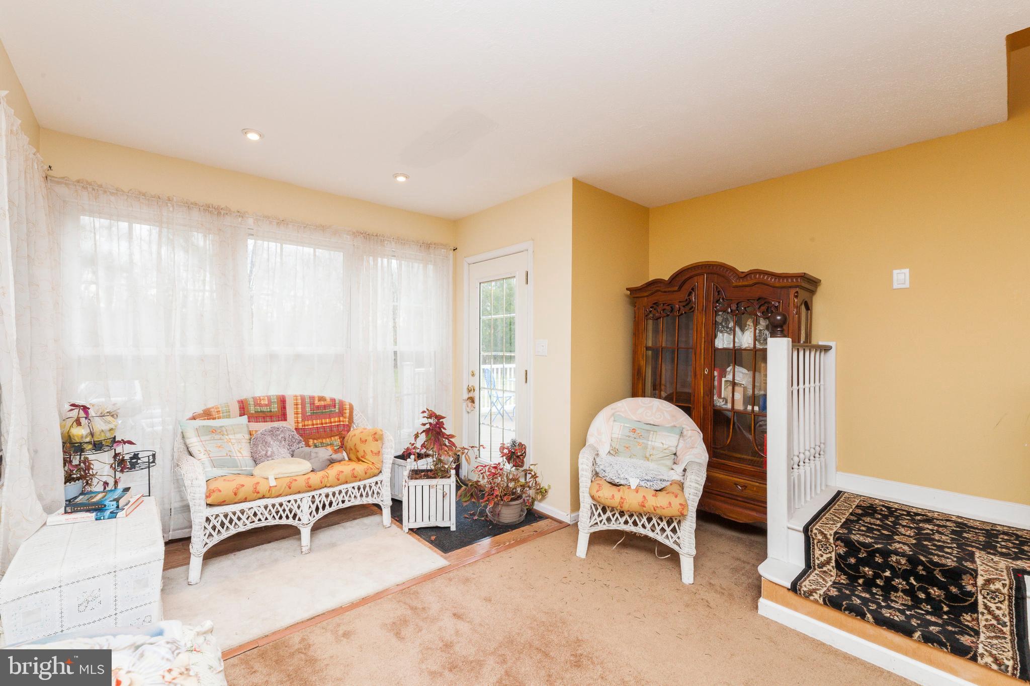 16000 Stone Foot Road Accokeek, MD 20607 - Photo 15 of 45 a living room with furniture and a large window