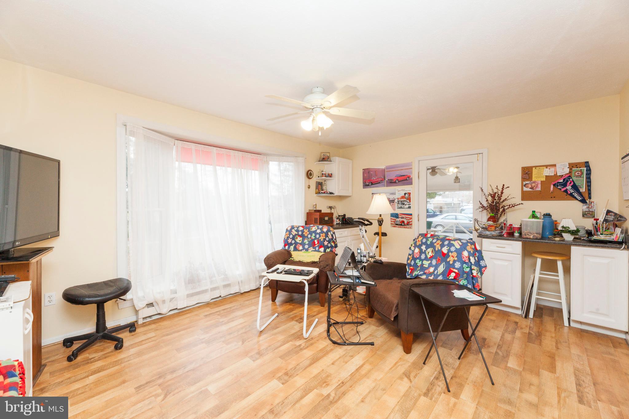 16000 Stone Foot Road Accokeek, MD 20607 - Photo 20 of 45 a living room with furniture and a flat screen tv