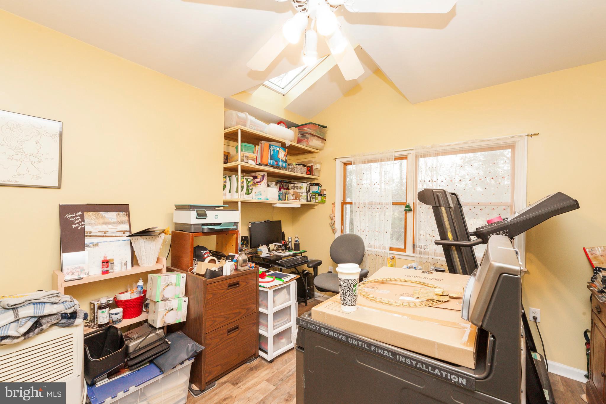 16000 Stone Foot Road Accokeek, MD 20607 - Photo 21 of 45 a view of a workspace with furniture and a rug