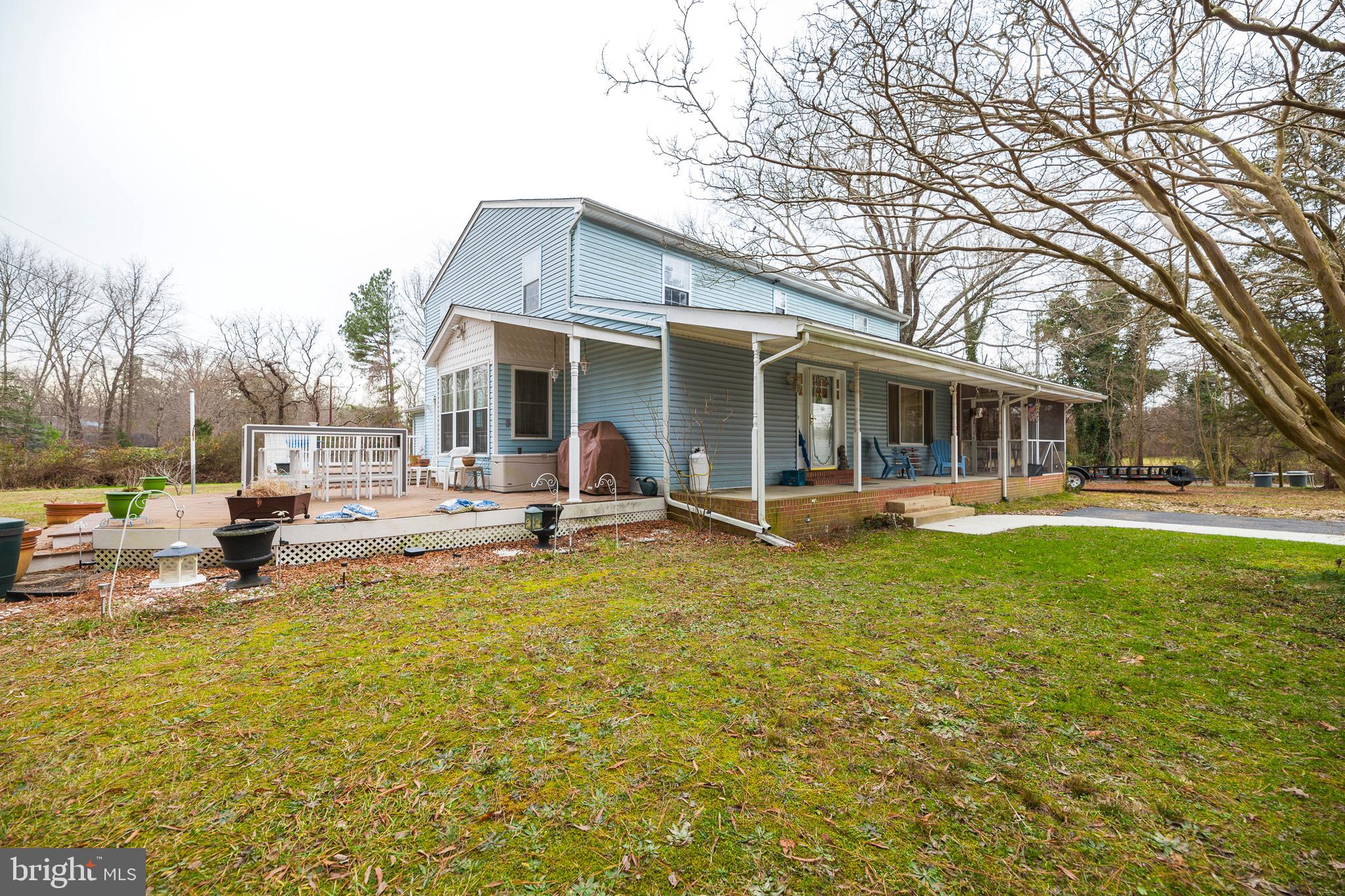 16000 Stone Foot Road Accokeek, MD 20607 - Photo 33 of 45 a view of a house with a backyard patio and swimming pool
