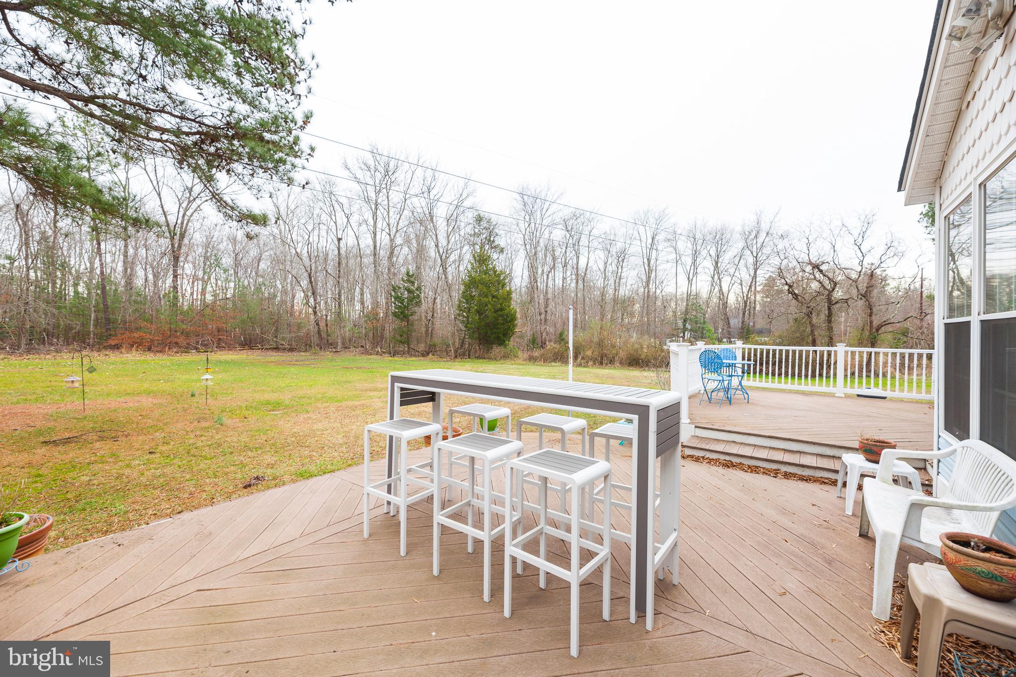16000 Stone Foot Road Accokeek, MD 20607 - Photo 36 of 45 a view of a swimming pool with outdoor seating and plants