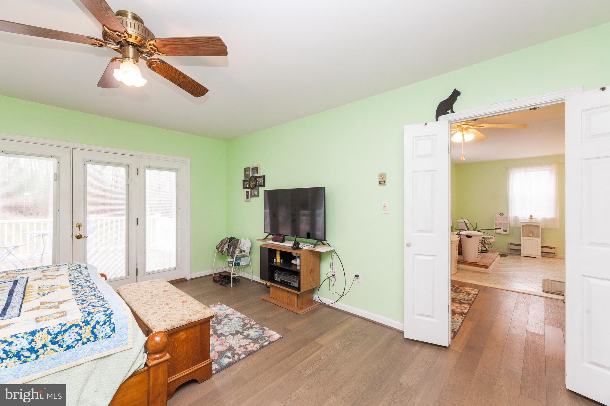16000 Stone Foot Road Accokeek, MD 20607 - Photo 6 of 45 a living room with furniture and a flat screen tv