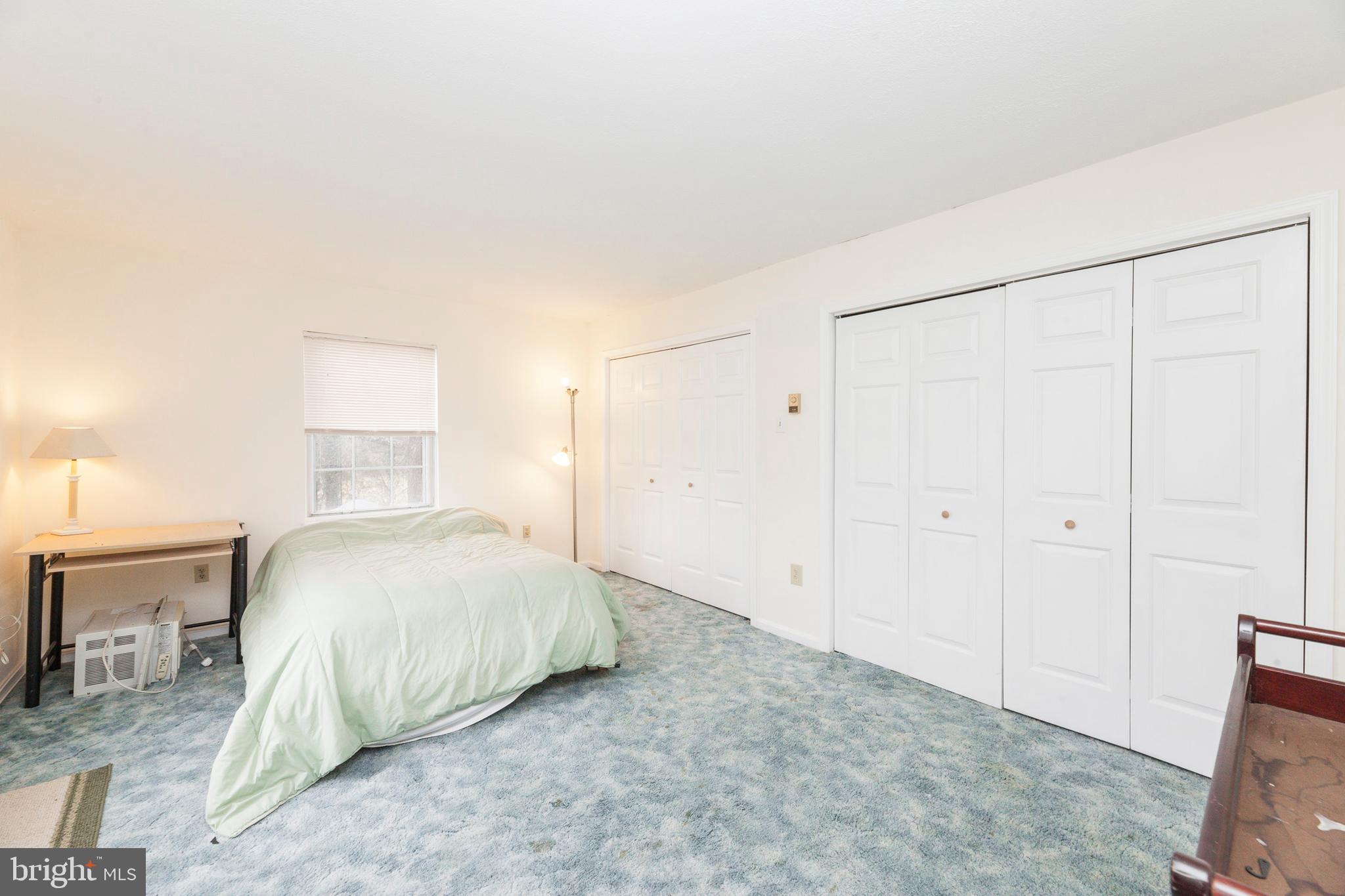 16000 Stone Foot Road Accokeek, MD 20607 - Photo 8 of 45 a bedroom with a bed and a cabinets