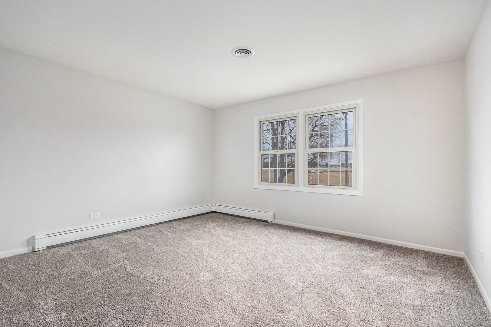 323 Chicago Road Oswego, IL 60543 - Photo 16 of 27 an empty room with windows