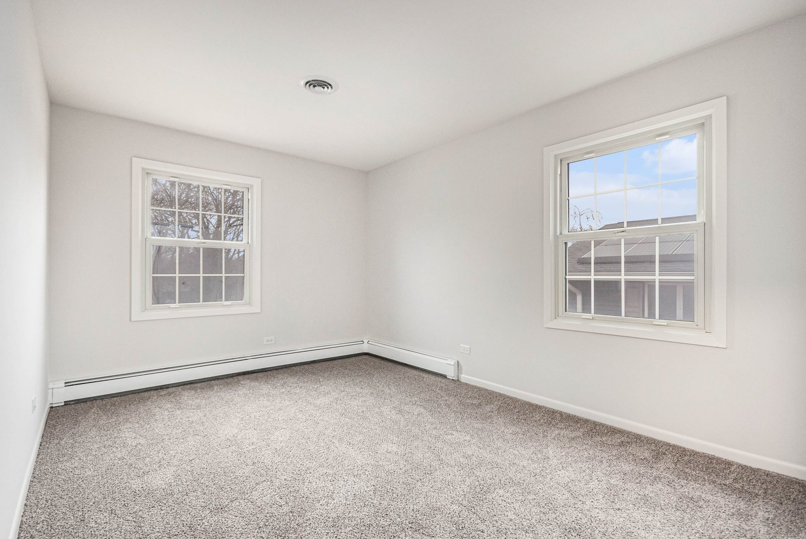 323 Chicago Road Oswego, IL 60543 - Photo 18 of 27 an empty room with a window