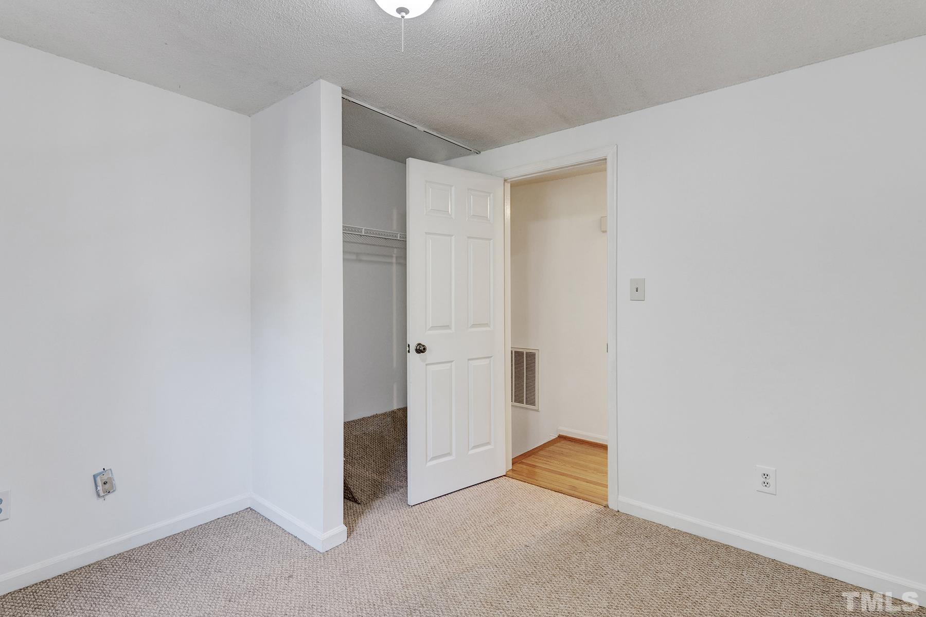 7317 Shellburne Drive Raleigh, NC 27612 - Photo 15 of 28 a view of an empty room