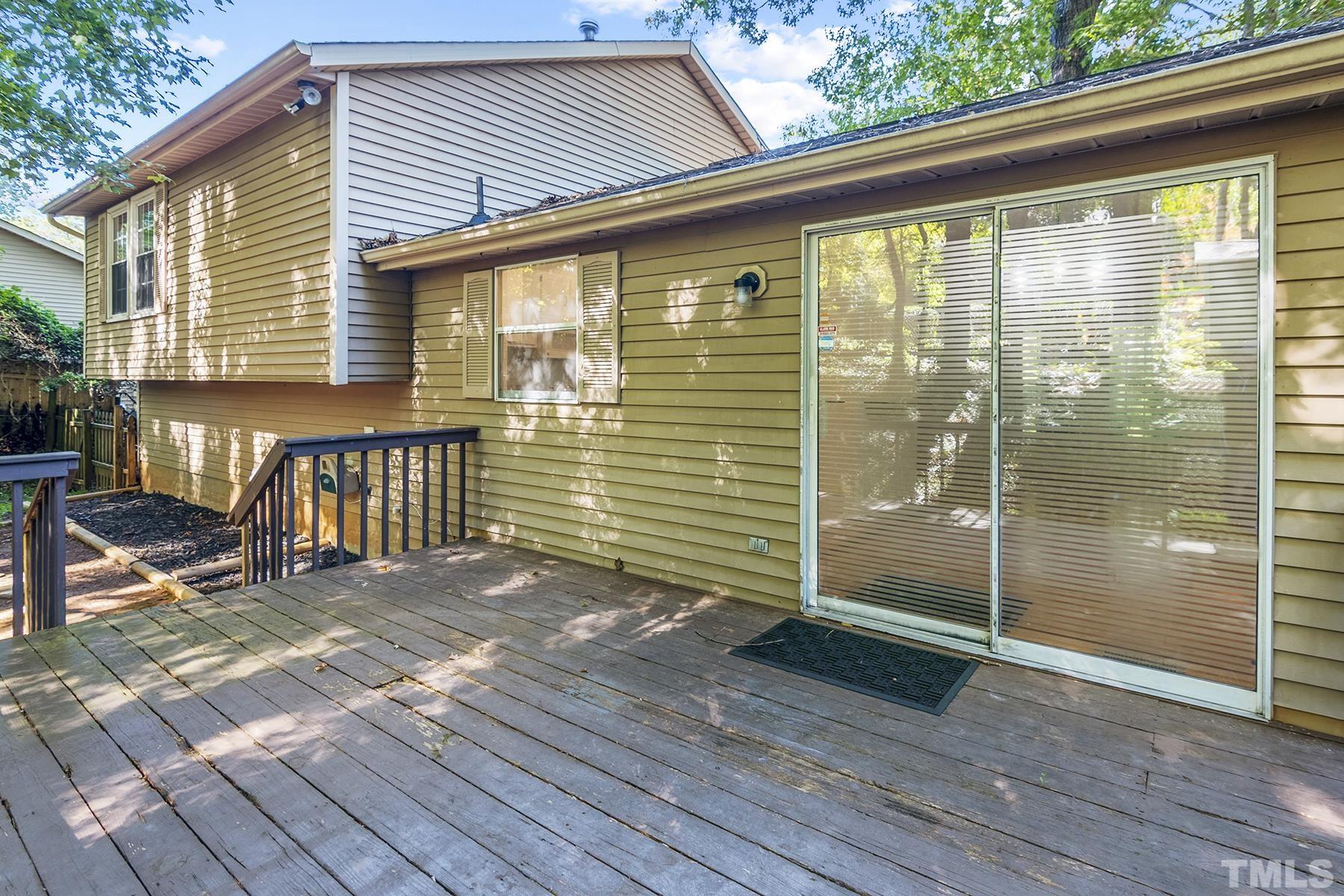 7317 Shellburne Drive Raleigh, NC 27612 - Photo 22 of 28 a balcony view with a glass door