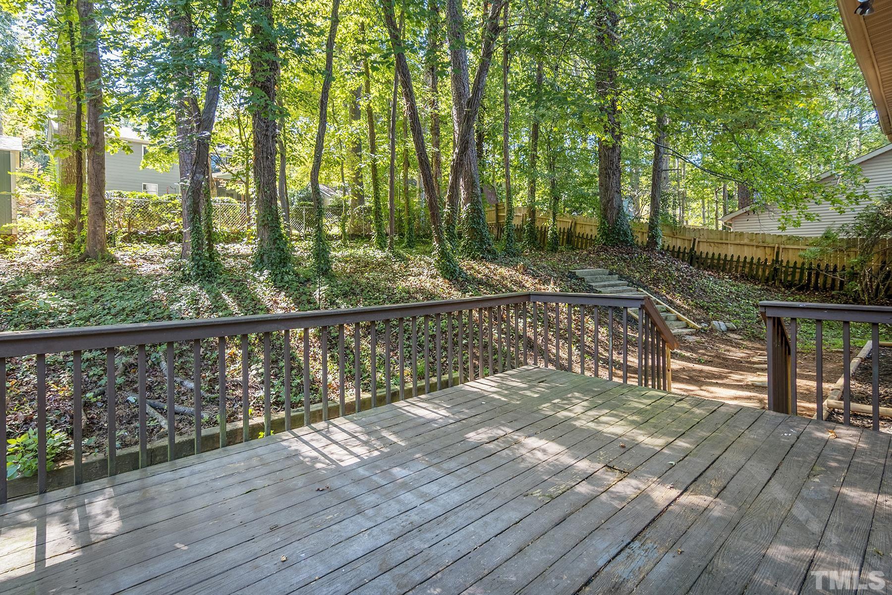 7317 Shellburne Drive Raleigh, NC 27612 - Photo 23 of 28 a view of balcony with deck and outdoor space