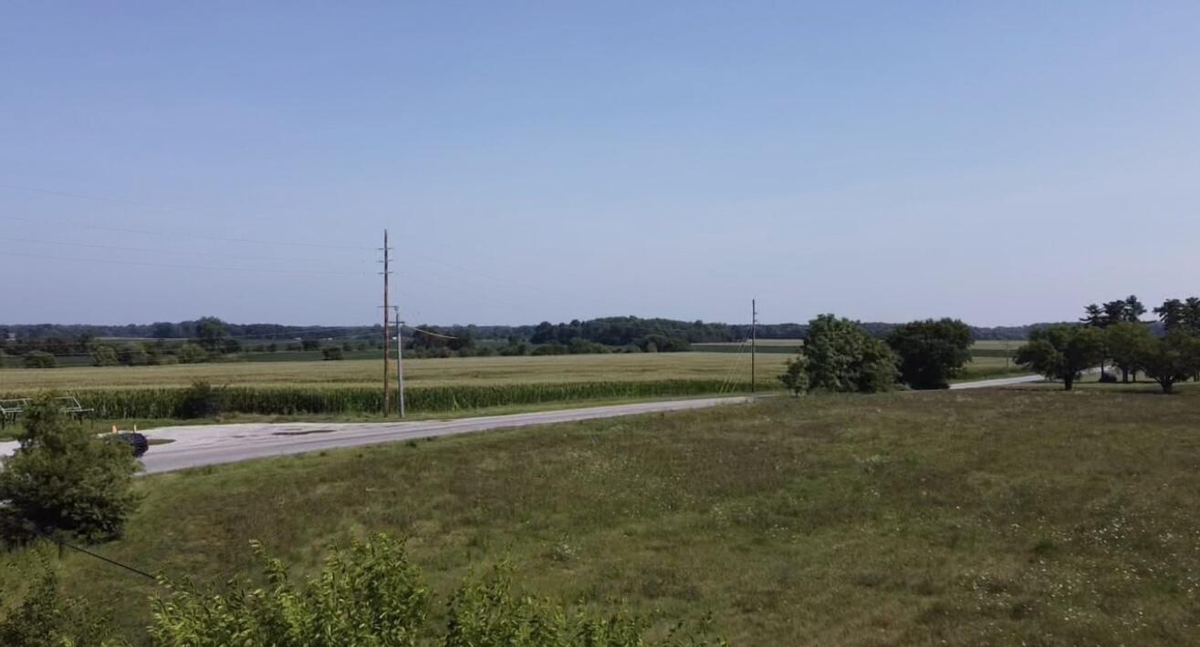 1000 South State Road 2 Hebron, IN 46341 - Photo 14 of 29 a view of a lake with a big yard