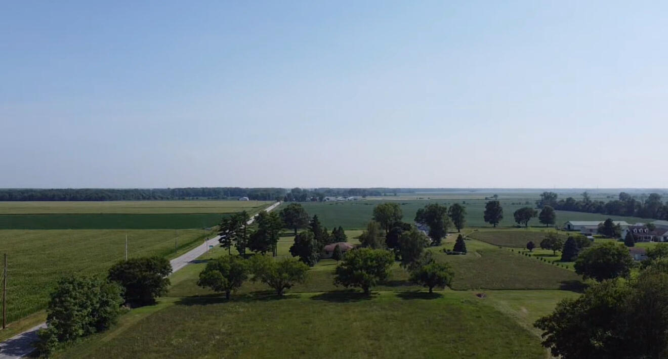1000 South State Road 2 Hebron, IN 46341 - Photo 8 of 29 an aerial view of a houses with outdoor space and garden