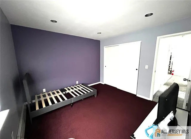 a view of a bathroom with wooden floor