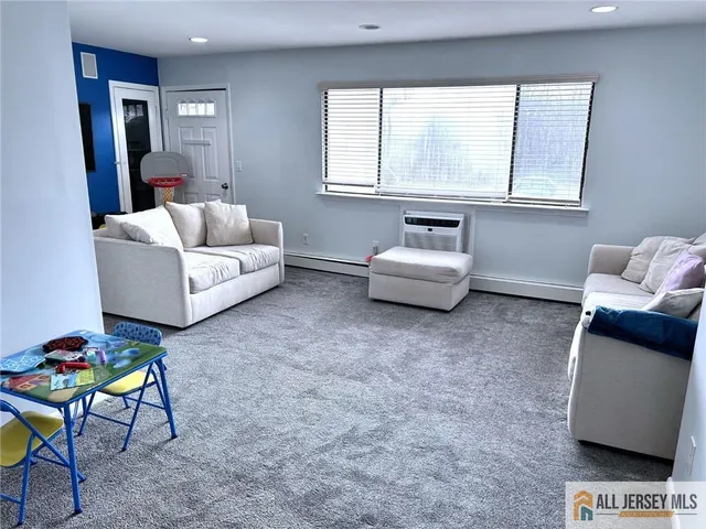 a living room with furniture and a couch