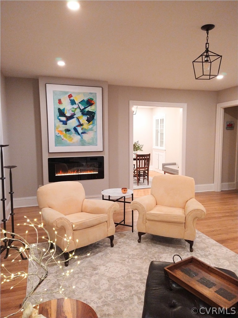 Modern electric Fireplace with remote to change crystals and flame colors.