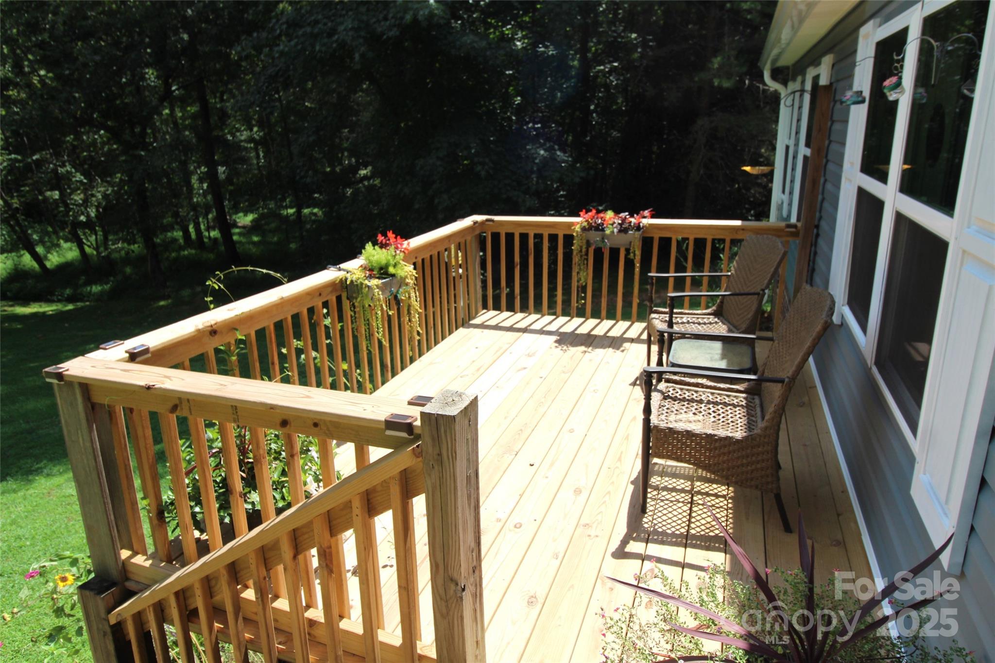 7035 Twin Streams Lane Clover, SC 29710 - Photo 2 of 22 a view of balcony with wooden floor and fence
