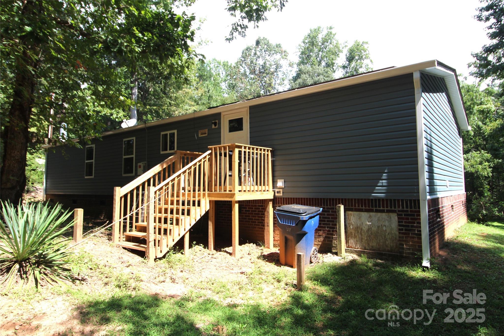 7035 Twin Streams Lane Clover, SC 29710 - Photo 21 of 22 a view of house with yard and entertaining space