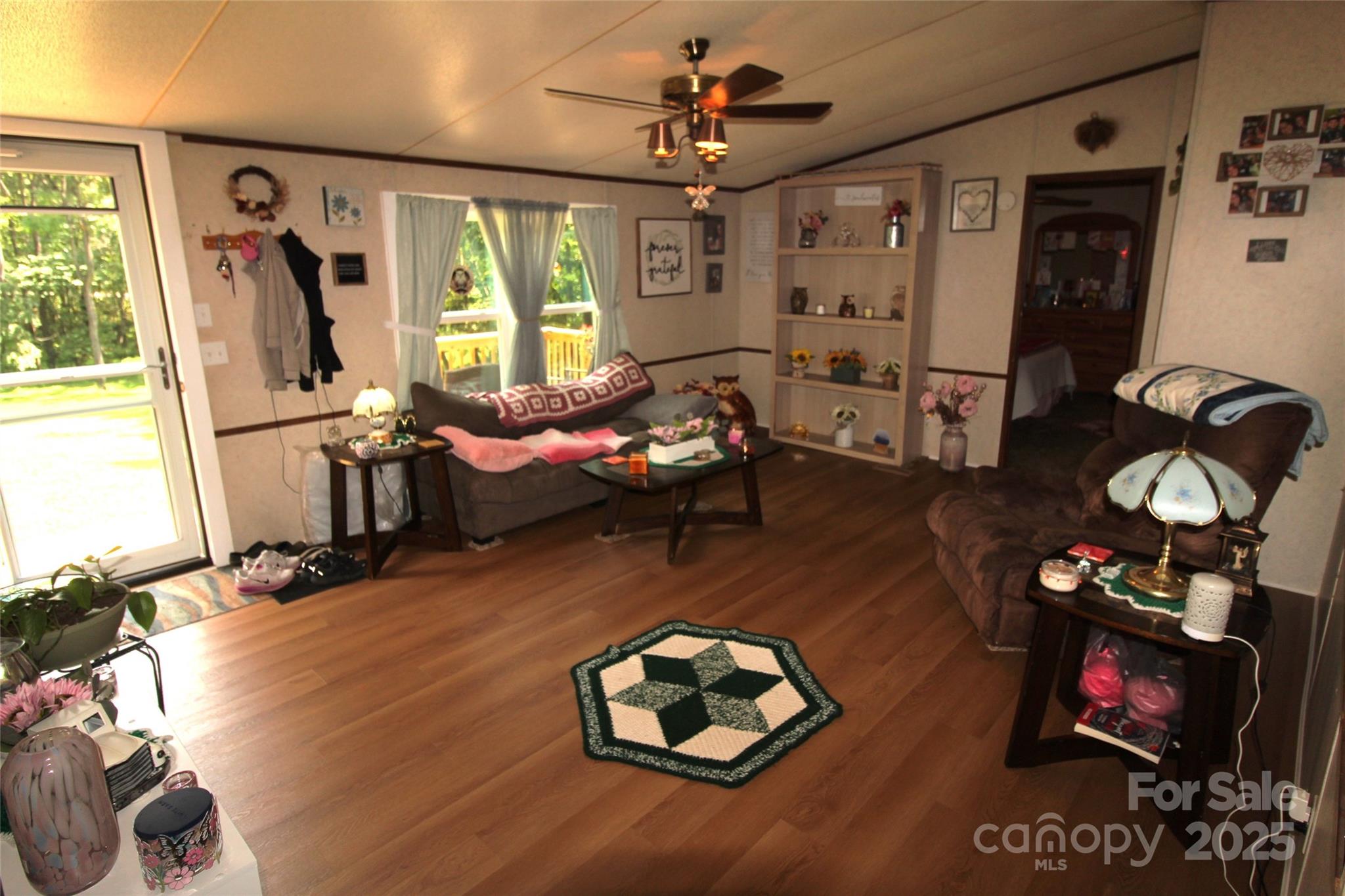 7035 Twin Streams Lane Clover, SC 29710 - Photo 3 of 22 a living room with furniture and a flat screen tv
