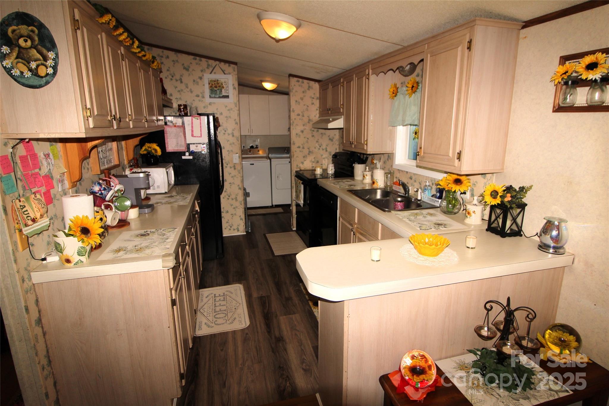 7035 Twin Streams Lane Clover, SC 29710 - Photo 6 of 22 a kitchen with a sink and cabinets