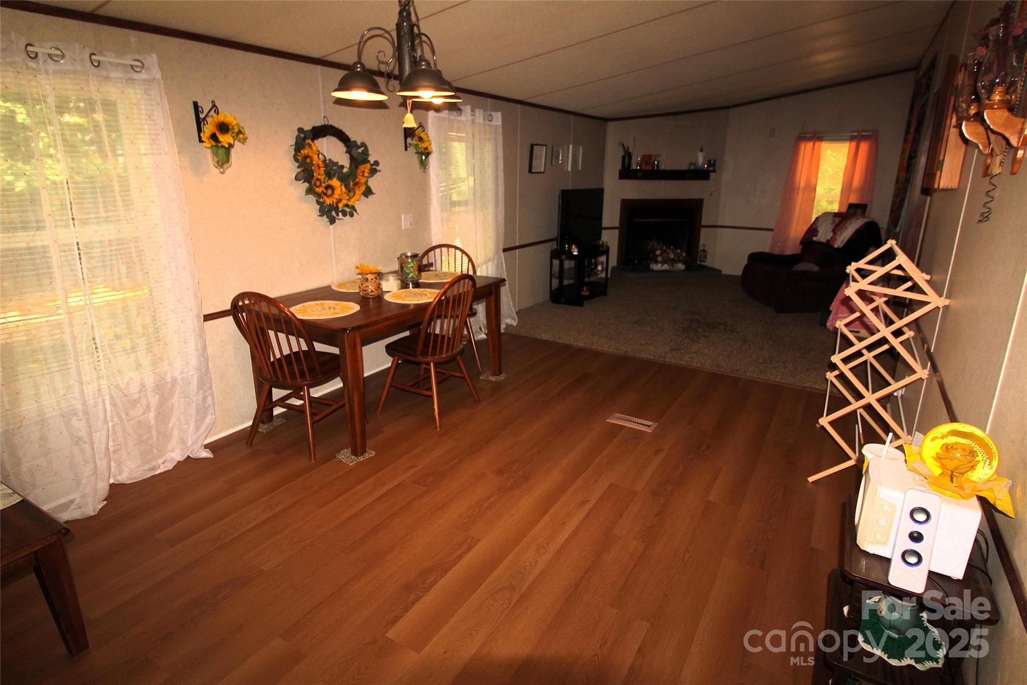 7035 Twin Streams Lane Clover, SC 29710 - Photo 9 of 22 a living room with furniture and a flat screen tv