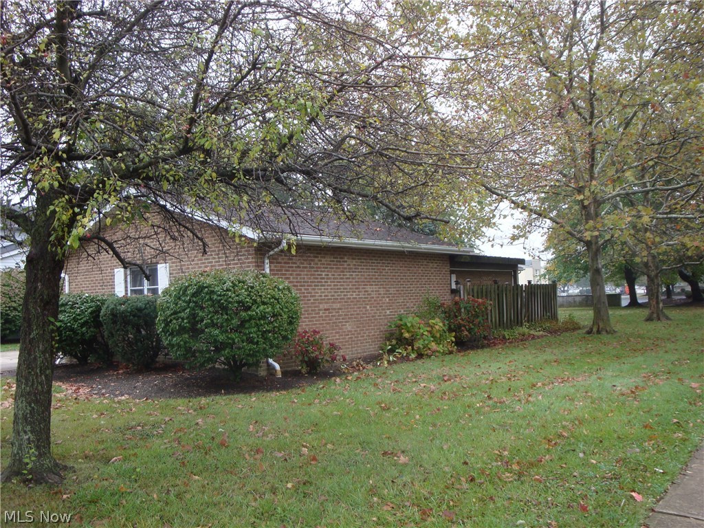 6340 Maplewood Road Mayfield Heights, OH 44124 - Photo 23 of 26 SIDE VIEW. ALL BRICK. ROOF 2011. FENCED IN COVERED PATIO.
