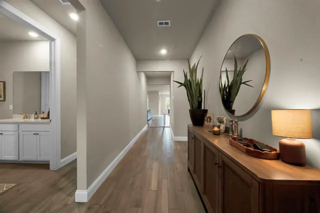 a room with furniture and a lamp