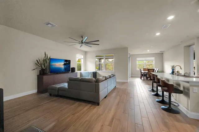 a bathroom with a sink toilet and a mirror