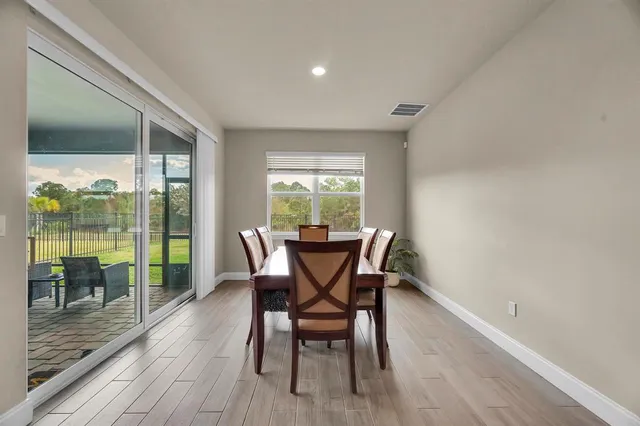 a bed room with a bed and a window