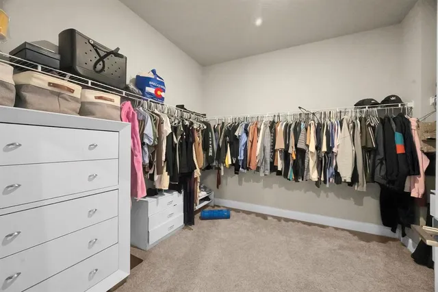 a en suite bathroom with double sink and a mirror