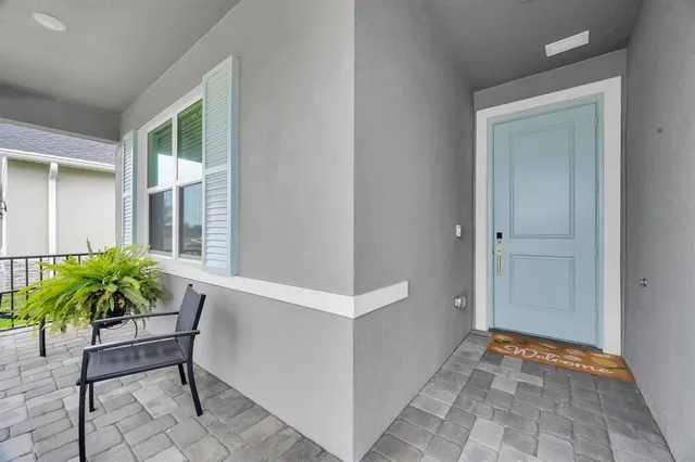 a outdoor space with patio the couches and a dining table with the view of the balcony