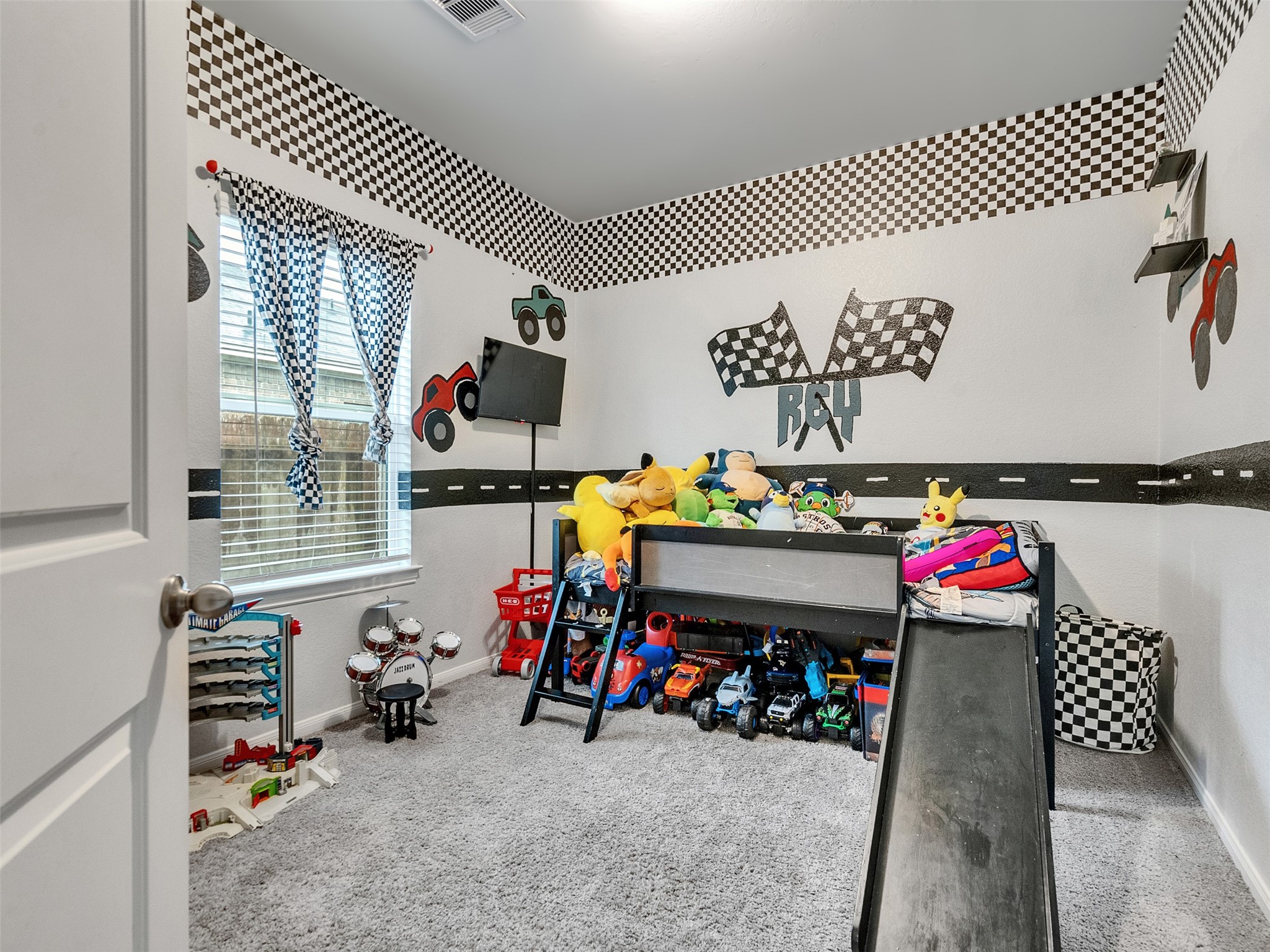 8719 Willet Street Baytown, TX 77521 - Photo 8 of 42 a view of a room with that has a large window